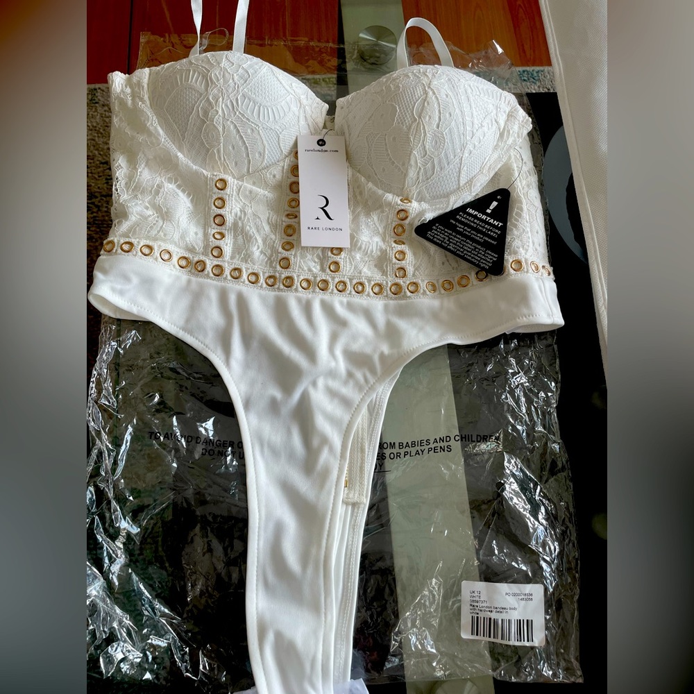 Rare London, white ladies bodysuit, never worn.